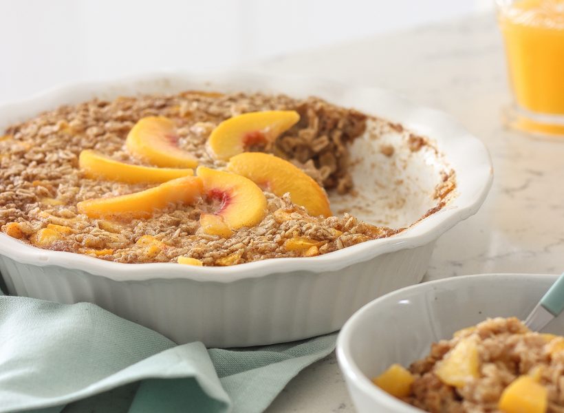 Blogger Liz Fourez of LoveGrowsWild.com shares a delicious peach baked oatmeal that is perfect for brunch or prepping a healthy breakfast for the week ahead.