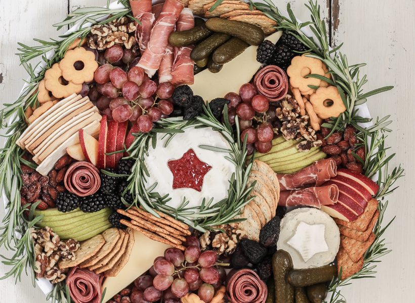 Learn how to make this stunning Wreath Charcuterie Board for your next holiday gathering from home blogger Liz Fourez of Love Grows Wild